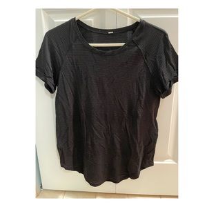 Womens black tie back top with gold stitching